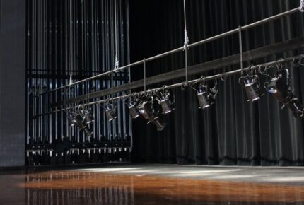 can it be shortenedStage lights on a truss above a wooden stage